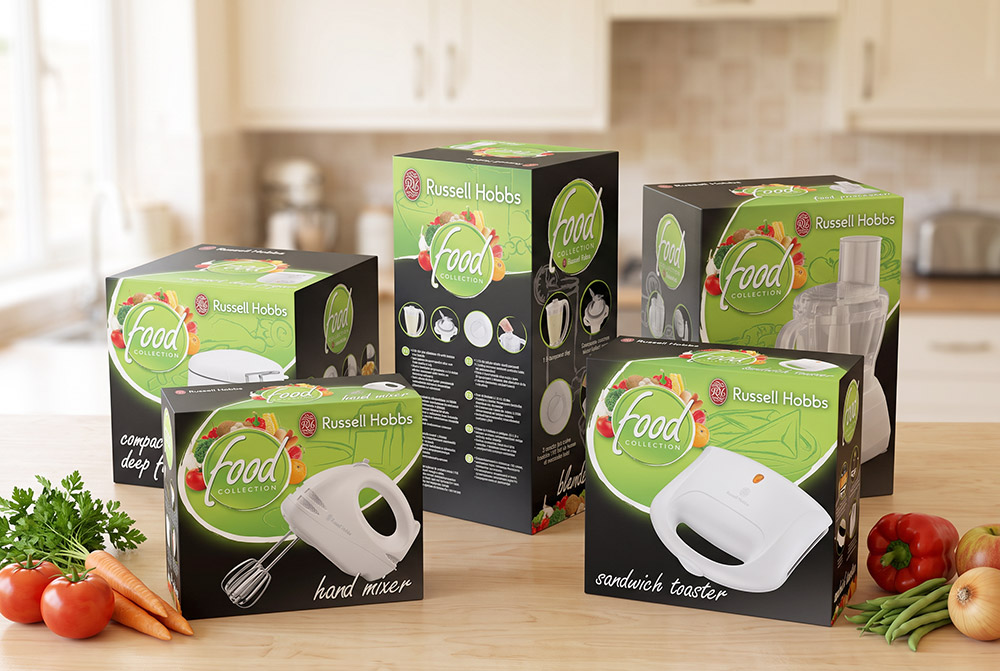 Russell Hobbs Food Collection packaging range, including hand mixer, sandwich toaster, blender and food processor boxes, on a kitchen worktop
