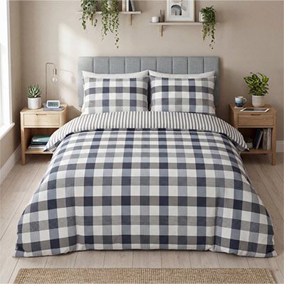Checked duvet set product photography, shot in a styled bedroom
