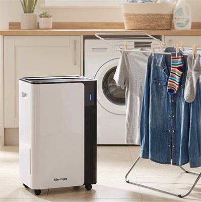 Dehumidifier product photography, shot in a styled utility room