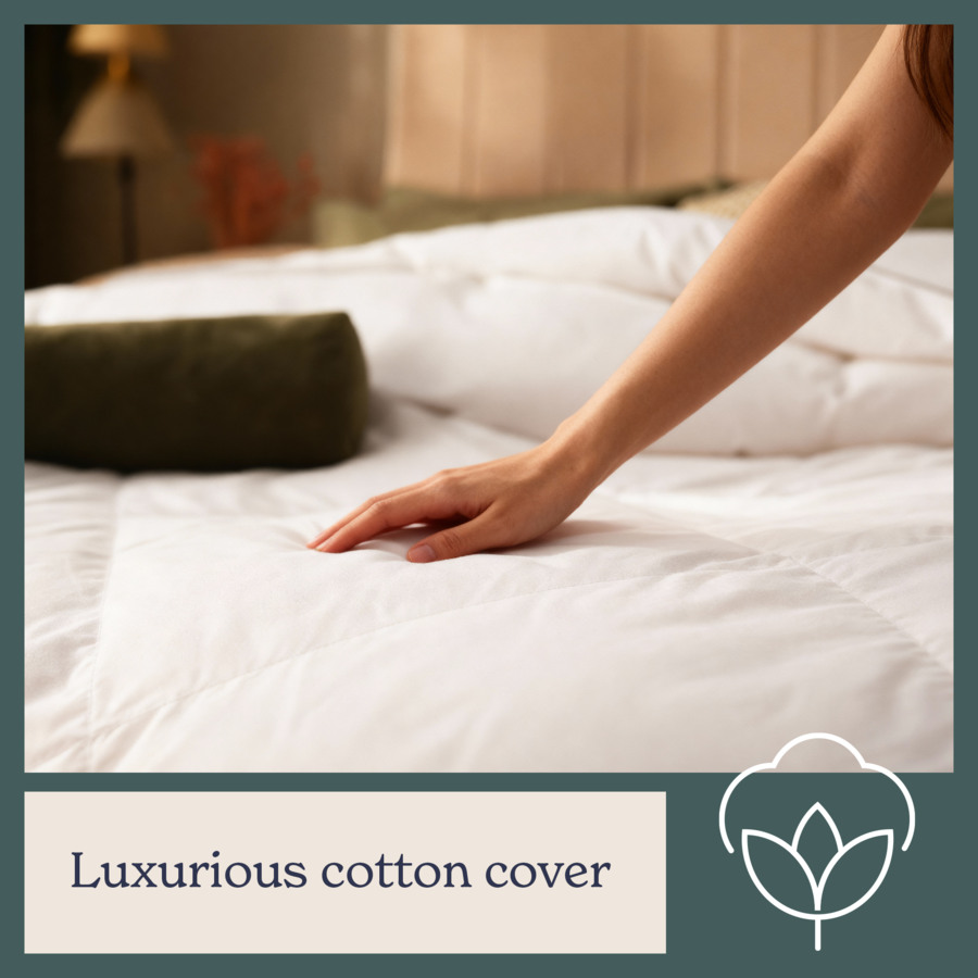 Close-up of a hand pressing a Sleepeezee duvet, with a Luxurious cotton cover banner